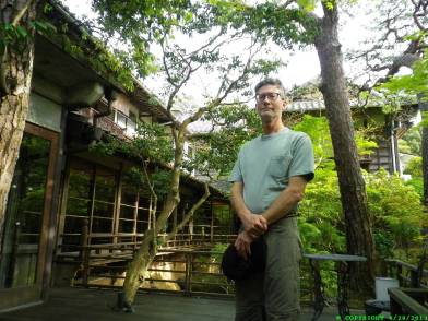 Bri in courtyard of 375 year old onsen (hotspring bath).