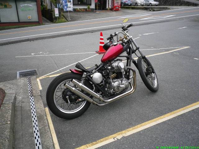Cool bike near a Wasabi stream and waterfall.